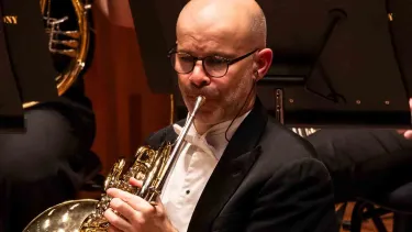 Euan Harvey plays the horn.