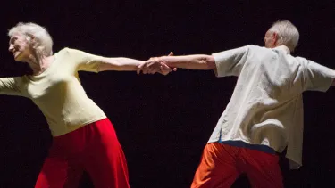 Senior performers dancing together