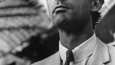 A person in a suit and tie.