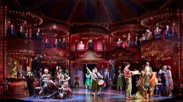 The cast of La Boheme on the stage.