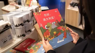 A person holding a book.