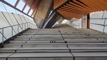 The granite stairs in the Western foyer covered with protective sheets.